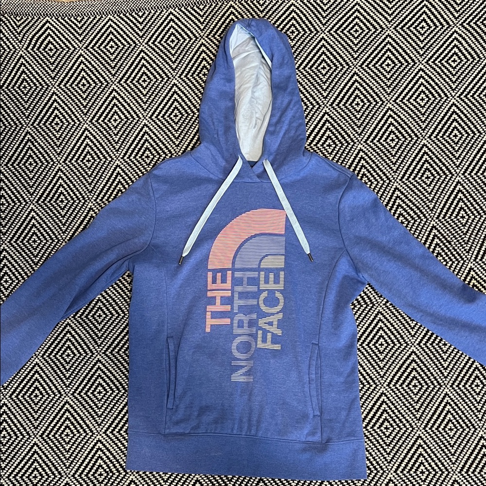 The North Face Blue Hoodie with Pink and White Accents